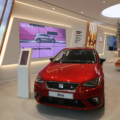 Video wall and pedestal digital signage within a SEAT car showroom