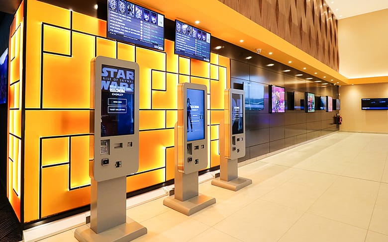Self-service freestanding ticket kiosks at a UK cinema