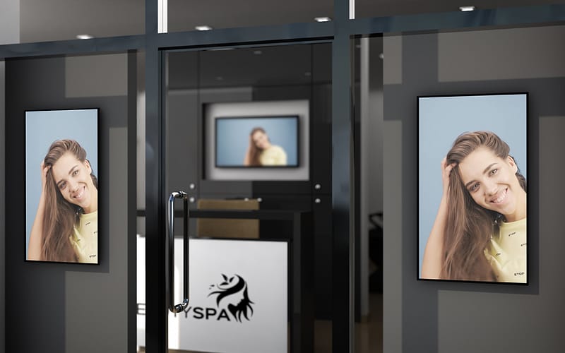 Vestel digital signage screens in the window of a hair salon